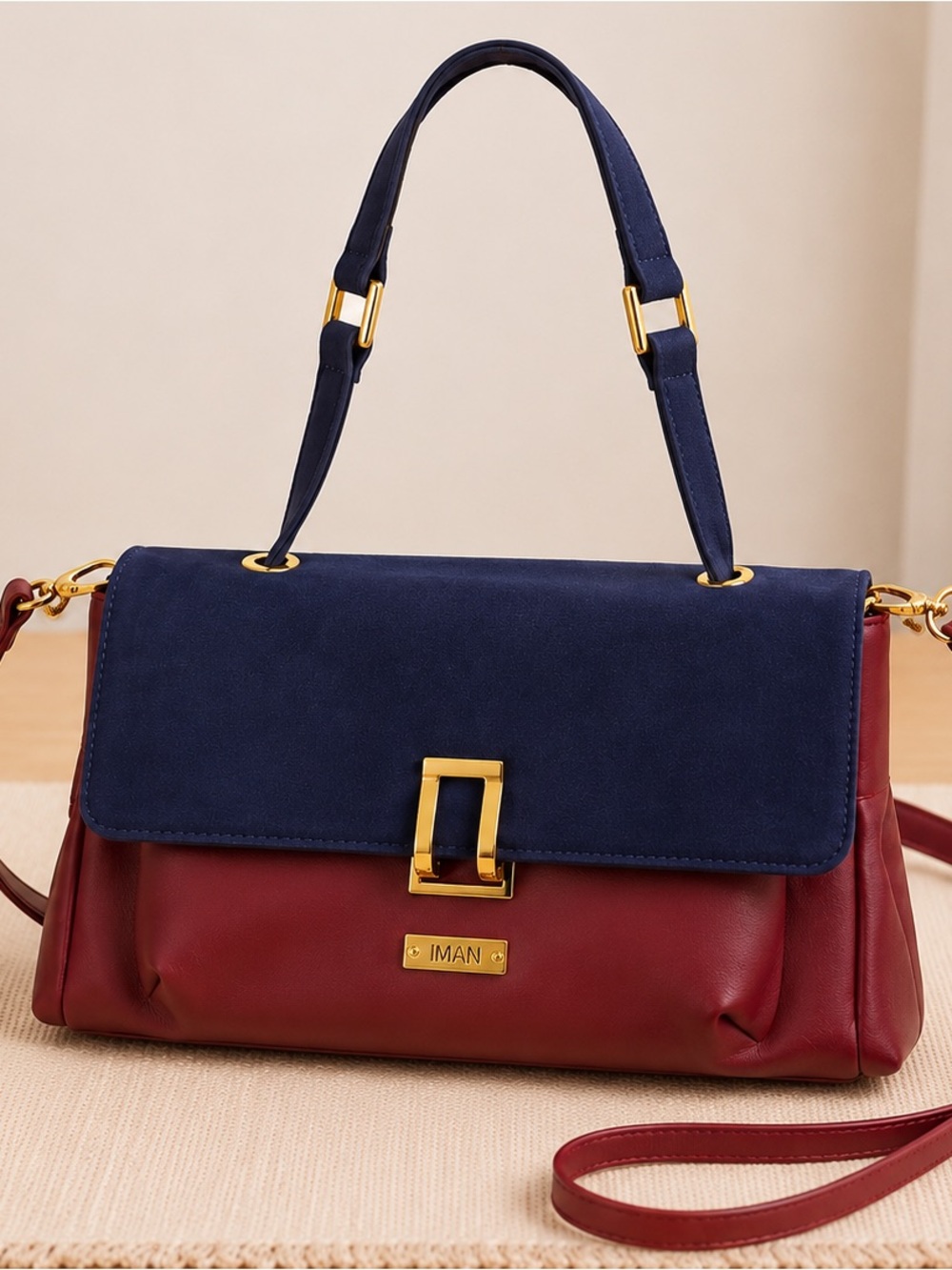 IMAN Two-Tone Navy and Burgundy Satchel with Gold Hardware